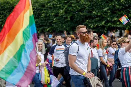 Dublin, Ireland, June 25th 2022. Ireland pride 2022 parade with people walking on one of the main city street. High quality photo