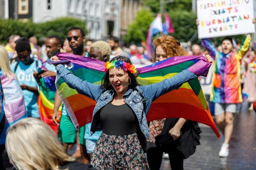 Dublin, Ireland, June 25th 2022. Ireland pride 2022 parade with people walking on one of the main city street. High quality photo