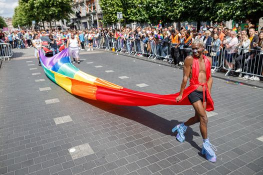 Dublin, Ireland, June 25th 2022. Ireland pride 2022 parade with people walking on one of the main city street. High quality photo