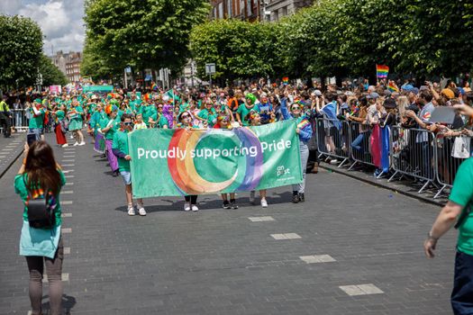 Dublin, Ireland, June 25th 2022. Ireland pride 2022 parade with people walking on one of the main city street. High quality photo