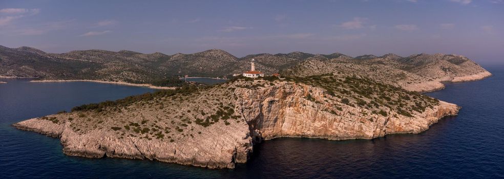 Panoramic photo of Cape Struga historic lighthouse atop steep cliffs on Lastovo, Croatia's most remote inhabited island and home to some of the darkest skies in Europe.