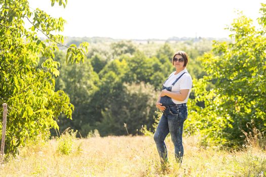 pregnant woman in the field