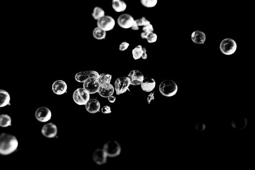 Silica Gel Beads on black background. Macro photography.