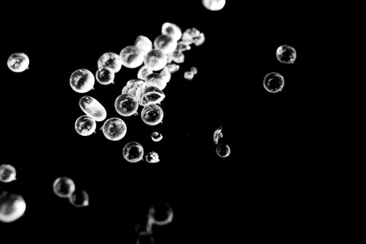 Silica Gel Beads on black background. Macro photography.