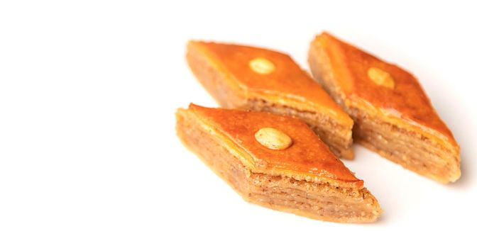 Oriental sweet baklava isolate on a white background. Selective focus. Food.