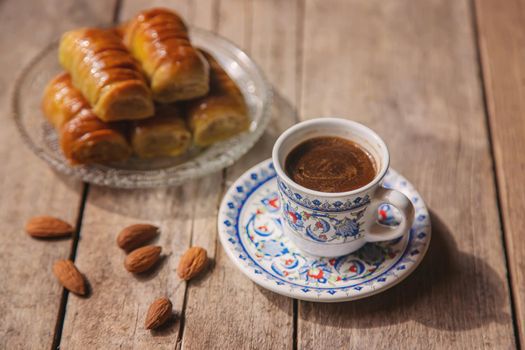 A cup of Turkish coffee and baklava. Selective focus. drink.