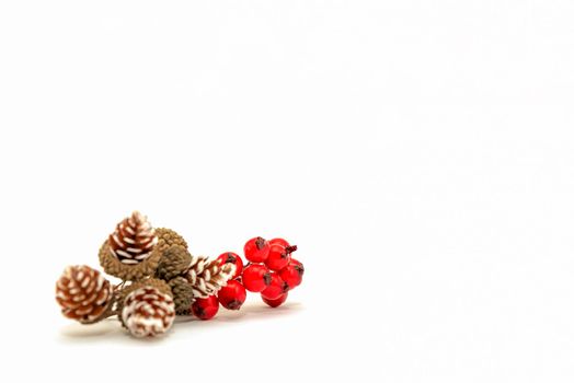 Christmas banner, isolate on white, cones and red berries are laid out on a white background. For print, postcard, design with place for text