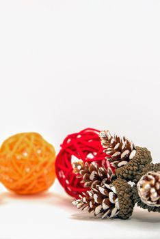 Christmas isolate on white, cones and red berries are laid out on a white background. For print, postcard, design with place for text