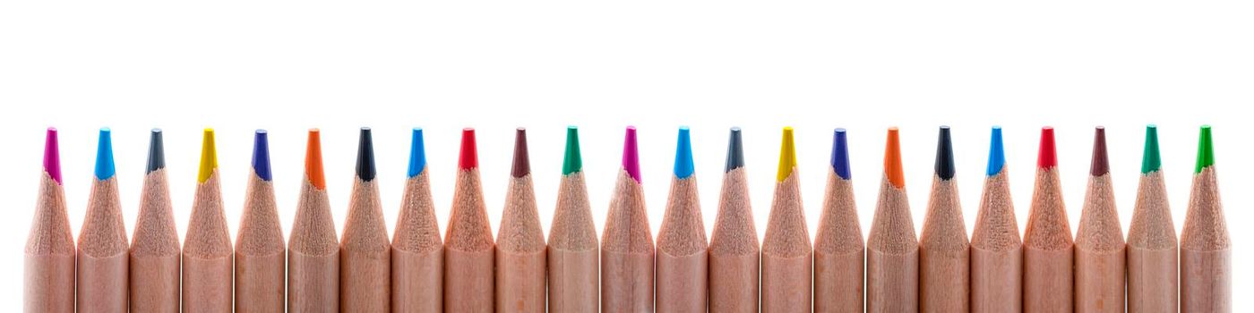 Isolate of multicolored wooden pencils. Pencils of different colors ,arranged in a rowstand out against a uniform white background, for insertion into a project or for printing a banner or label