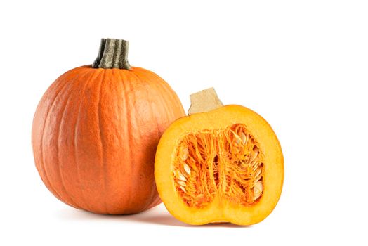 Pumpkin on a white background. Halloween theme. Sliced pumpkin on a white isolate. Highlight the pumpkin to insert into your project or design. Casts a shadow.