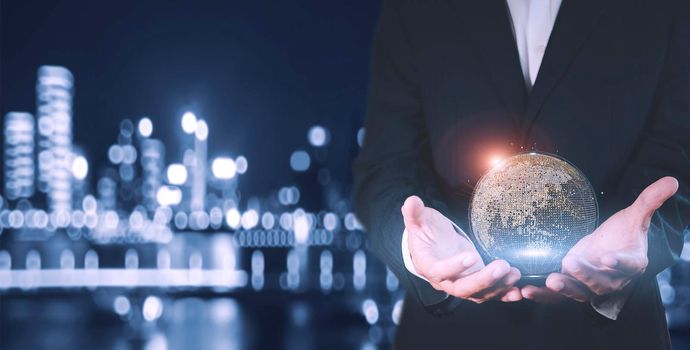 Businessman holding in hand with global connection concept. Businessman holding in hands with global connection concept. Energy saving concept.