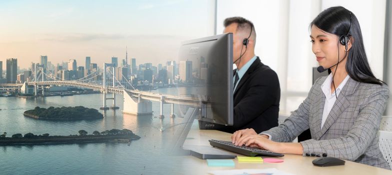 Business people wearing headset working in office to support remote customer or colleague. Call center, telemarketing, customer support agent provide service in broaden view .