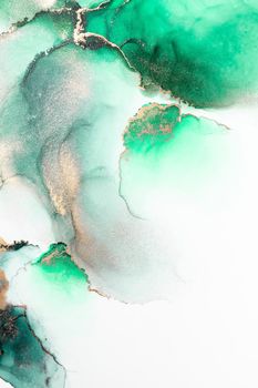 Green gold abstract background of marble liquid ink art painting on paper . Image of original artwork watercolor alcohol ink paint on high quality paper texture .