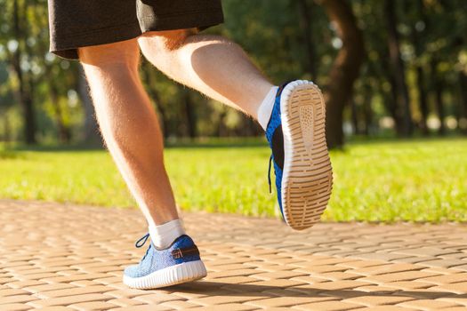 Legs.Move.Speed, man is running on summertime