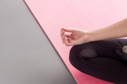 Closeup shoot. FIngers in yoga posture. Studio shot