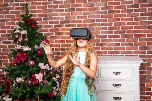 girl using virtual reality headset on new year holidays and enjoy.