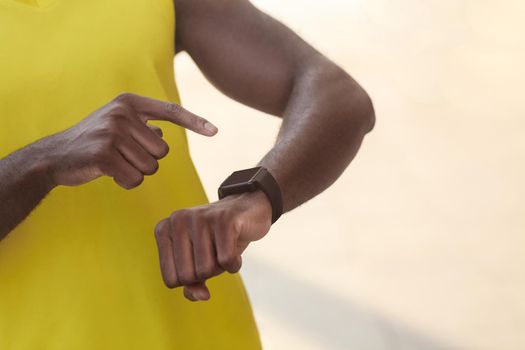 Closeup detail. Fingers, smart watch, hands. Sport concept