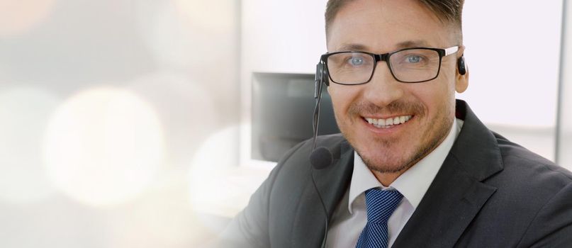 Business people wearing headset working in office to support remote customer or colleague. Call center, telemarketing, customer support agent provide service in broaden view .