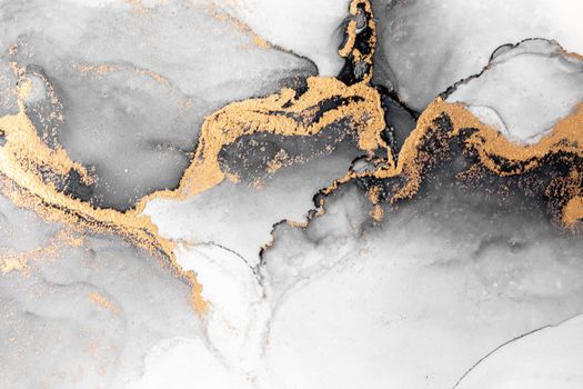 Black gold abstract background of marble liquid ink art painting on paper . Image of original artwork watercolor alcohol ink paint on high quality paper texture .