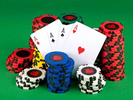 poker chips on a green table background