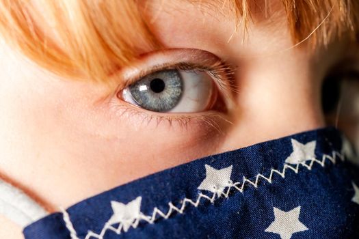 Close up of girl wearing a mask during the pandemic.