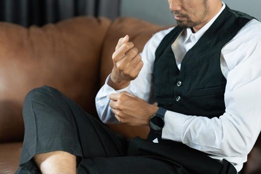 Asian Businessman waiting business partner at office