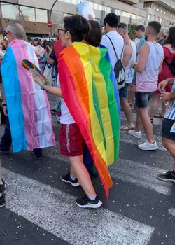 Valencia, Spain 25 June 2022: Manifest of a attractive participants of the World Pride festival in Valencia 2022. Parade of a International People celebrates the LGBT Gay Pride Parade