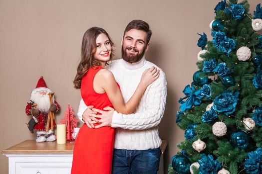 Shot of a young happy couple in love celebrating christmas. holidays and celebration concept.