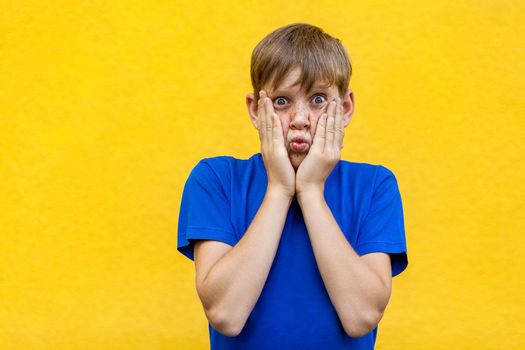 Dont know. Funny freckled boy in yellow glasses. Studio shot