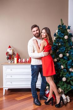 Shot of a young happy couple in love celebrating christmas. holidays and celebration concept.