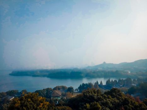 view from Leifeng Pagoda Hangzhou West Lake autumn scenery .mountain range at sunrise sunset orange sky beautiful landscape .peaceful background concept idea. fall autumn season of colorful scene beautiful landscape .West lake Hangzhou China