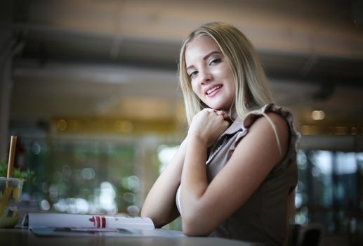 portrait young beautiful blond hair women smiling at camera.