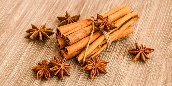 Cinnamon and star anise on wooden background, Herbs and Spices over wooden background, christmas bakery or cooking