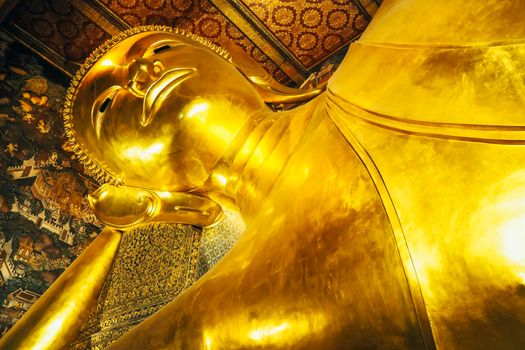 Reclining Buddha (Wat Pho) . Reclining Buddha gold statue. Wat Pho, Bangkok, Thailand