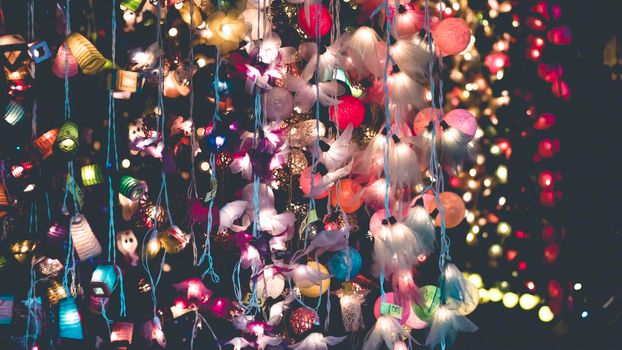 Chinese lantern festival image . Colourful Paper Lantern hanging decorate interior and exterior .outdoor Romantic idea . Christmas Eve  lights, lanterns in paper bags at night along road, street