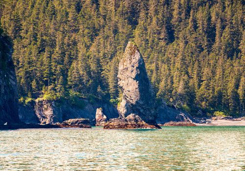 Dramatic rocky outcrops in Resurrection Bay near the port of Seward in Alaska