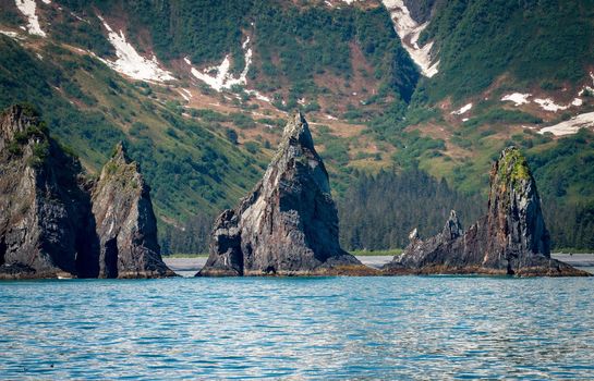 Dramatic rocky outcrops in Resurrection Bay near the port of Seward in Alaska