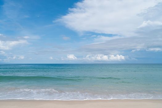 Tropical nature clean beach and white sand in summer with sun light blue sky.