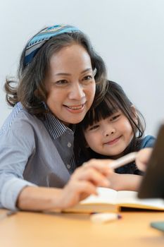 Happy moment of Daughter enjoying time together with mother at home. little child girl having fun