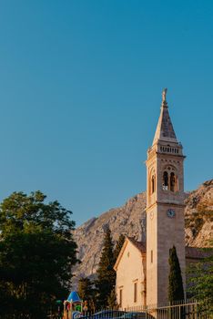 Beautiful view of the coast of Kotor Bay and St.Eustace's Church in the village Dobrota in Montenegro. Church of St. Eustachius is located in Dobrota , Kotor Montenegro