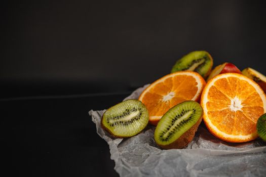 Luxurious fruit background. Studio photography of various fruits isolated on black background. Copy space. high resolution product