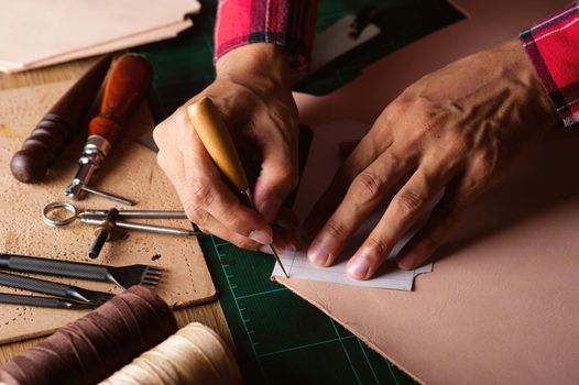 Working with vegetable tanned leather. Leather and the craft tools.