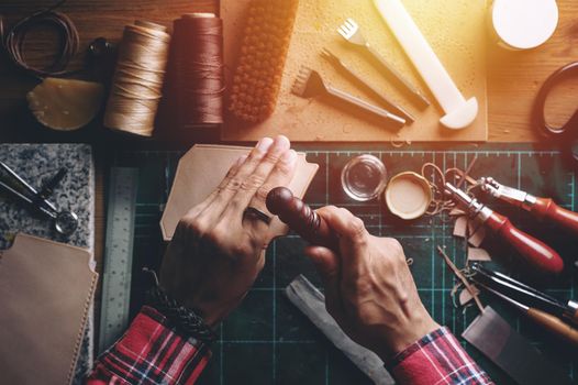 Working with vegetable tanned leather. Leather and the craft tools.