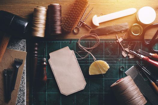 Working with vegetable tanned leather. Leather and the craft tools.