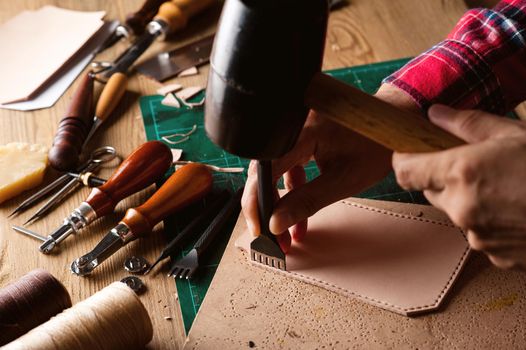 Working with vegetable tanned leather. Leather and the craft tools.