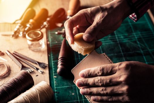 Working with vegetable tanned leather. Leather and the craft tools.