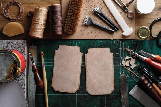 Working with vegetable tanned leather. Leather and the craft tools.