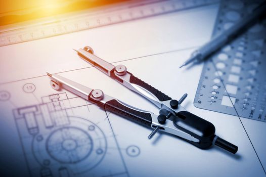 closeup compasses on the engineer's table, tool for industrial drawing