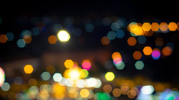 Colorful bokeh beautiful abstract background idea graphic. Night and light blur out of focus image. .
