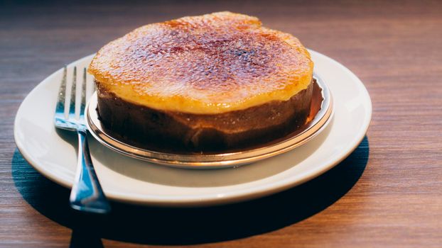Caramelized Baked Custards. Crème brulee. Vanilla Crème Brulee .popular Portuguese dessert. Leite Crème. Portuguese Custard Tarts